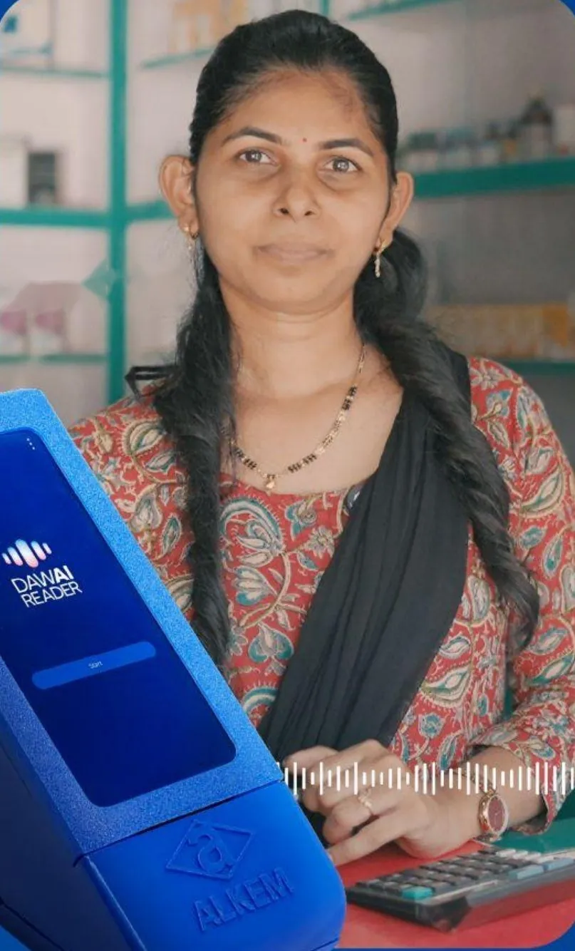 Sunita Shinde of Shree Dutta Medical with the DawAI Reader on her counter